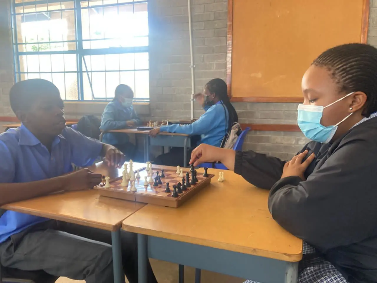 Learners playing Chess