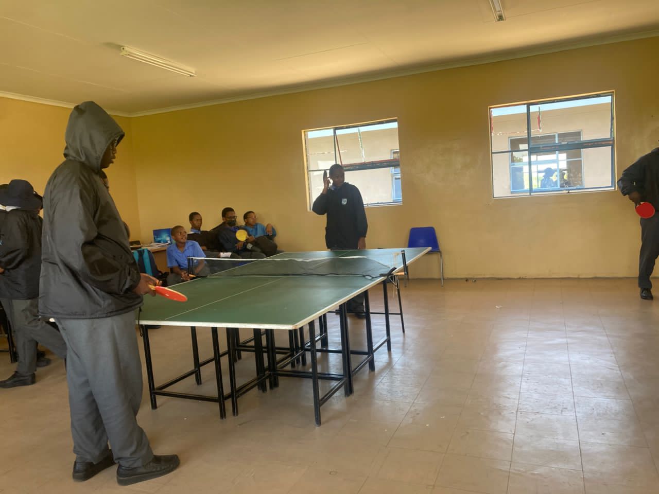 Students playing table tennis