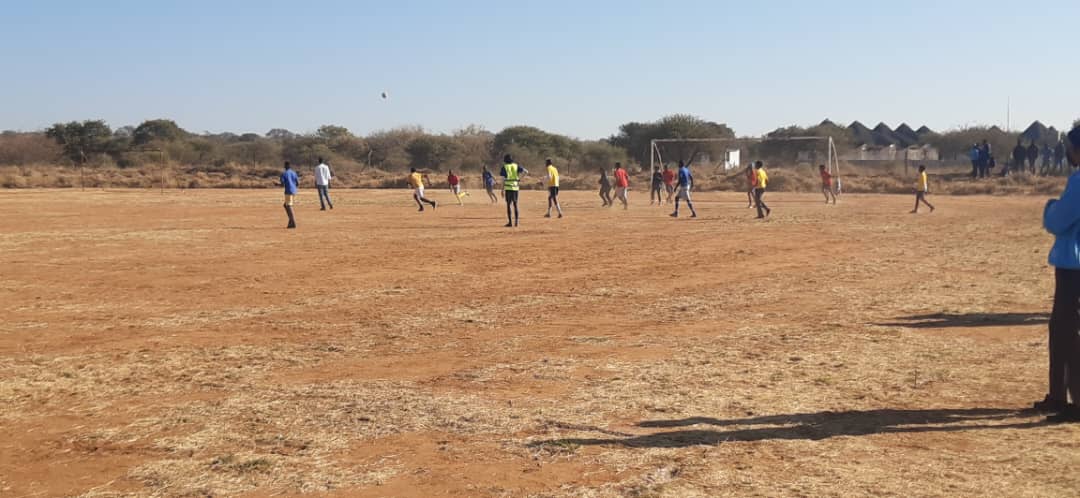 Football team practicing on the field
